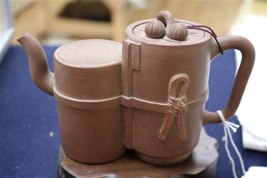 A Yixing double teapot, with wood stand